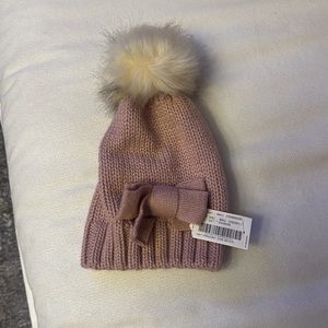 Copper key faux fur hat